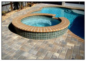 Pool Deck Brick Installation Using Beige Coping