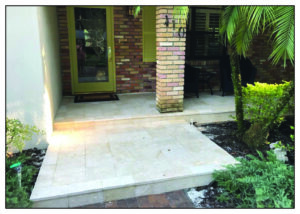 Travertine Entryway through a back garden