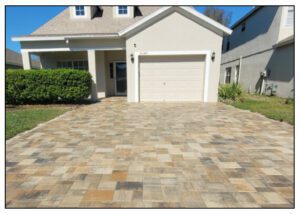 Long view of the beige color stones in front of the house