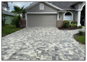 Long view of the grey color stones in front of the house