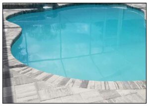 Close view of the gray color stones around swimming pool