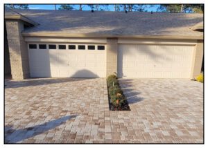 A driveway with a brick driveway and a brick driveway with a brick driveway and a brick driveway with a brick driveway and a brick driveway with a brick driveway and a brick driveway with a brick driveway and.